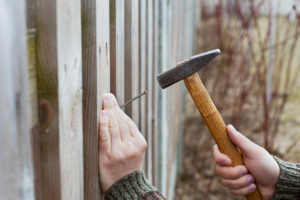 Should I replace my fence, or is it worth repairing?