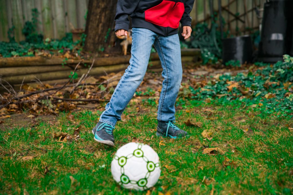 kid playing soccer